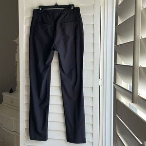 Footjoy mens pants with flat front and rear and side pockets in black. 32x34